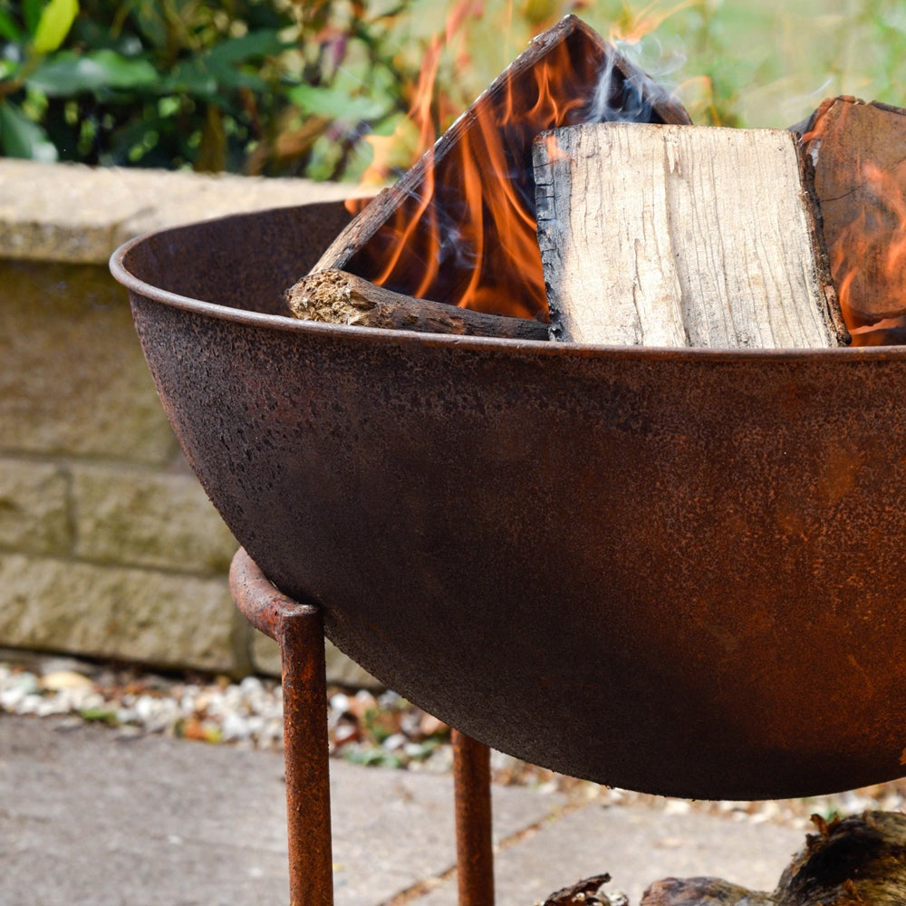Product photograph of Ivyline Outdoor Cast Iron Fire Pit On Stand In Rust from Olivia's.