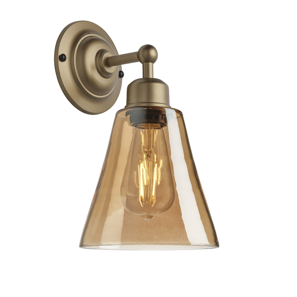Product photograph of Industville Orlando Tinted Glass Flask Amber Wall Light 6 Inch Brass Holder from Olivia's