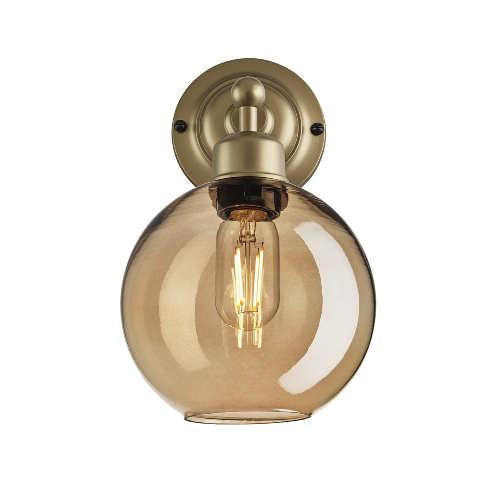 Product photograph of Industville Orlando Tinted Glass Globe Amber Wall Light 7 Inch Pewter Holder from Olivia's.
