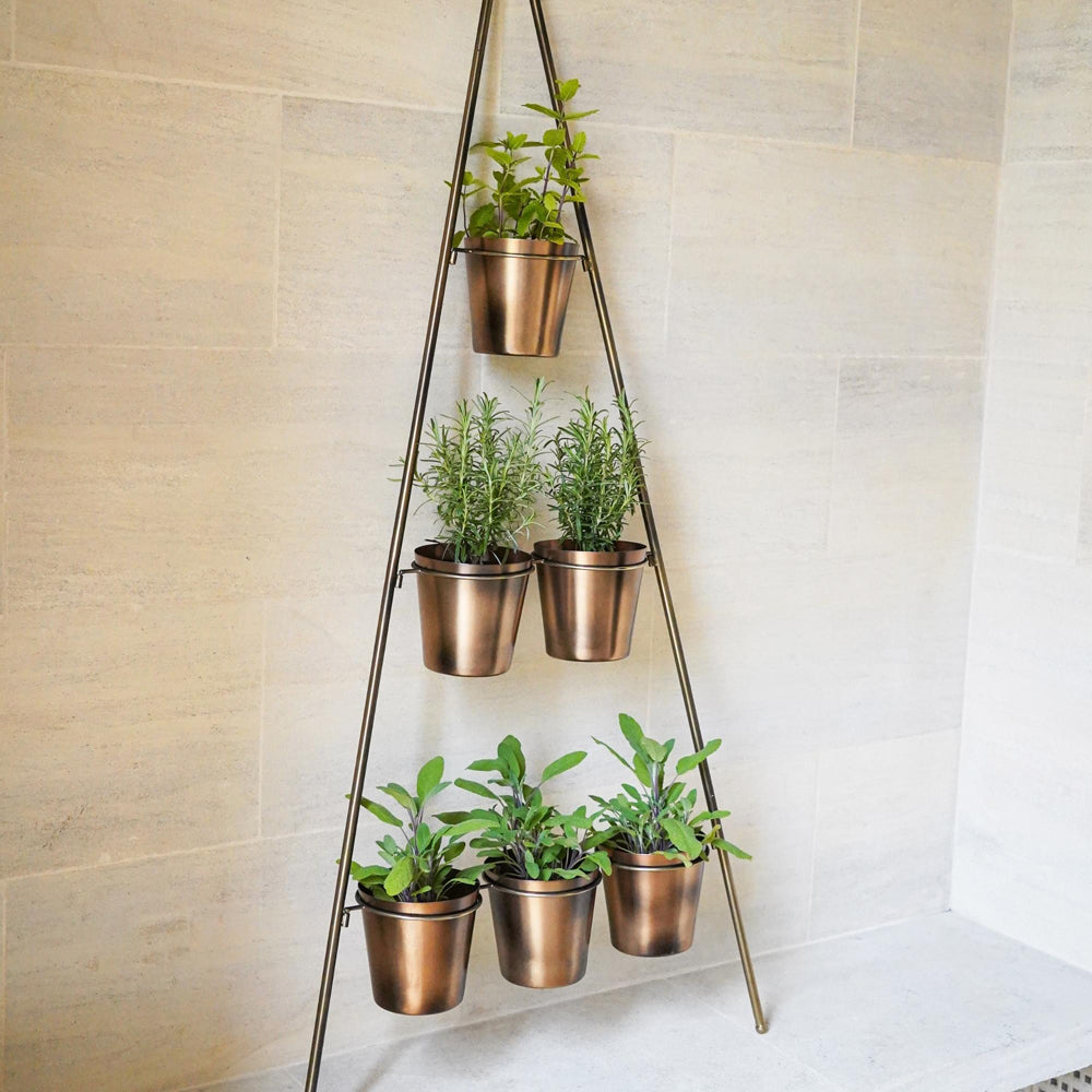 Product photograph of Ivyline Outdoor Vertical Gold Metal Wall Plant Stand With Planters Large from Olivia's.