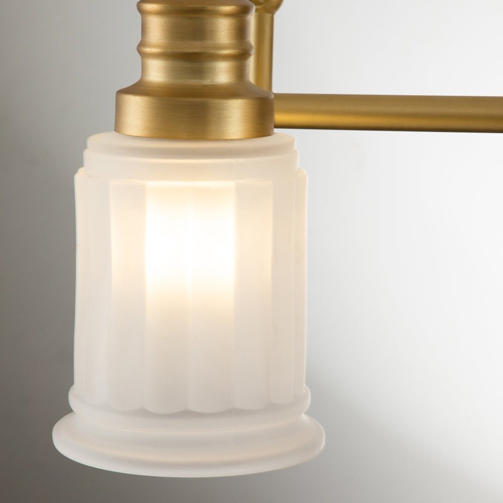 Product photograph of Quoizel Swell 3 Light Wall Light In Brass from Olivia's.