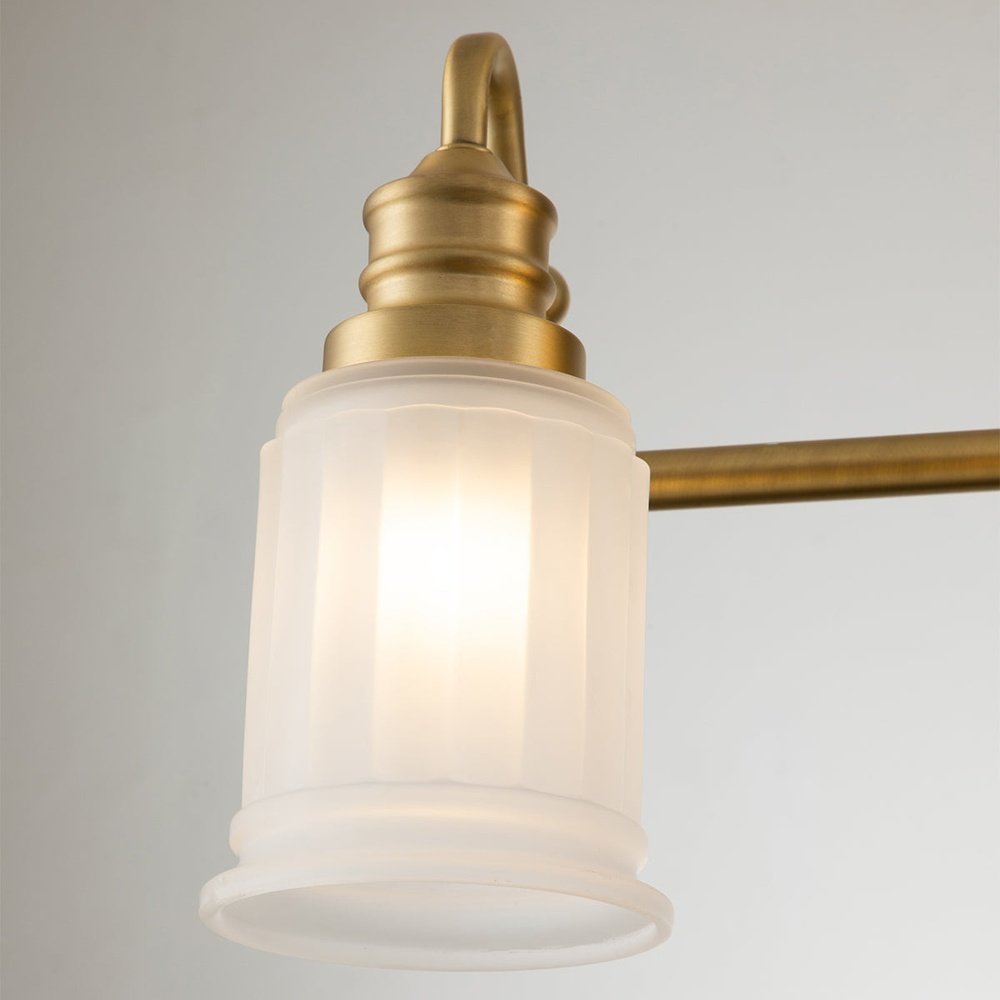 Product photograph of Quoizel Swell 4 Light Wall Light In Brass from Olivia's.
