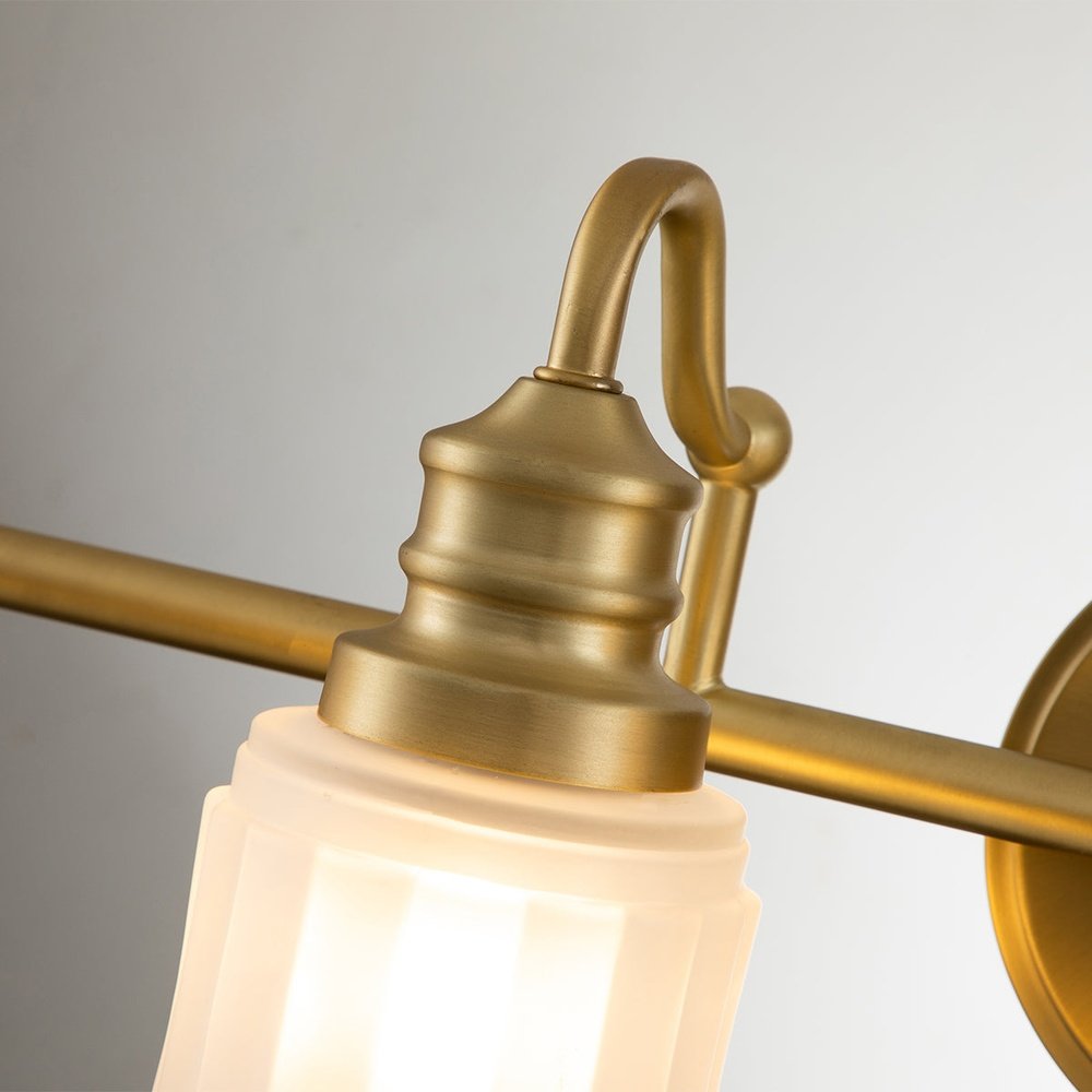 Product photograph of Quoizel Swell 4 Light Wall Light In Brass from Olivia's.