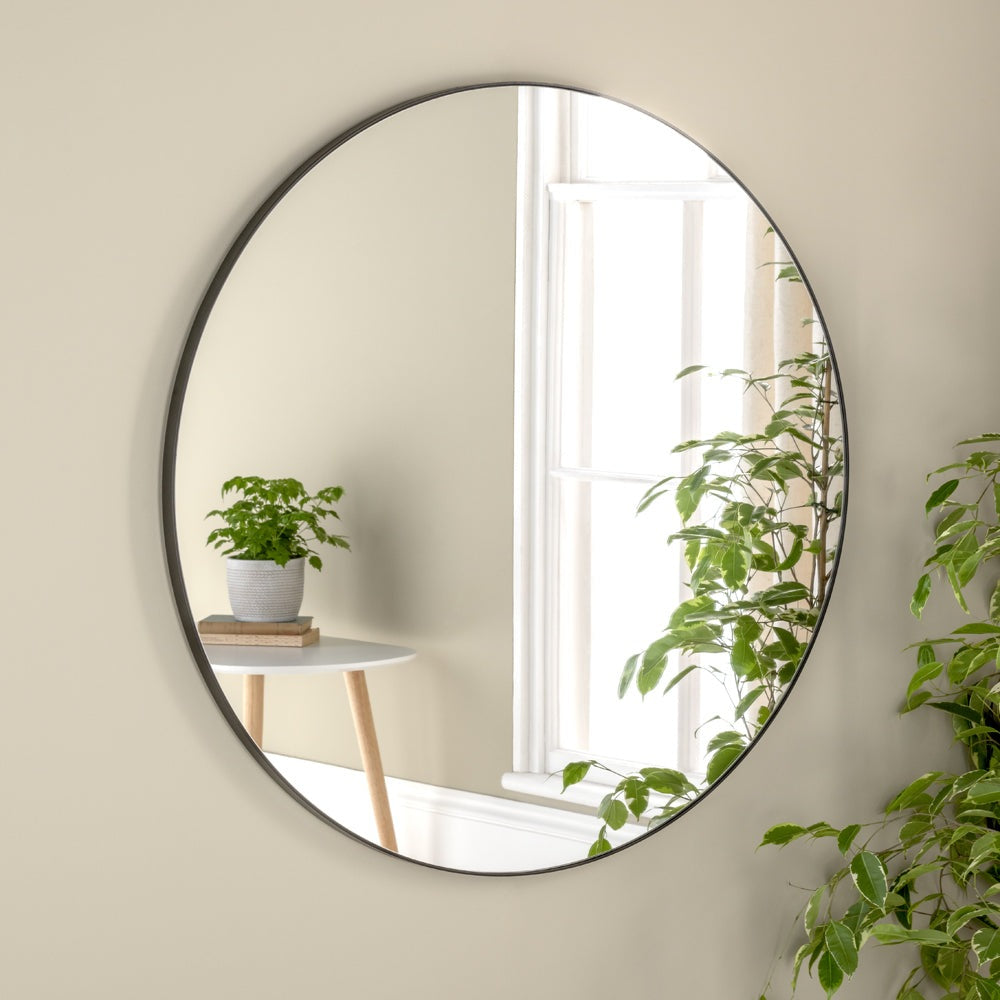 Product photograph of Olivia S Tuvalu Round Wall Mirror In Black from Olivia's