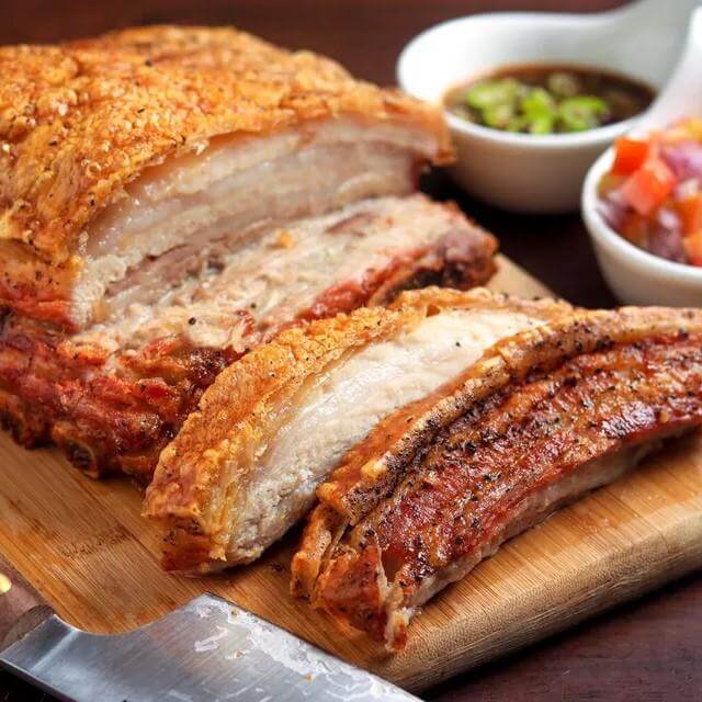 https://cdn.shopify.com/s/files/1/2698/6542/products/slow-roasted-pork-belly-crispy-skin-1.jpg?v=1638540660