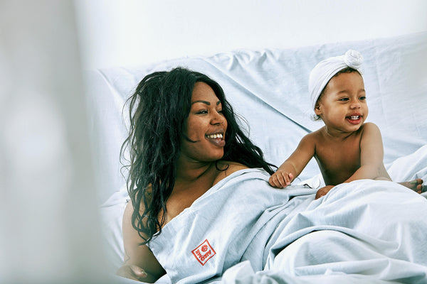 Mama and baby in AIZOME Natural Indigo sheets