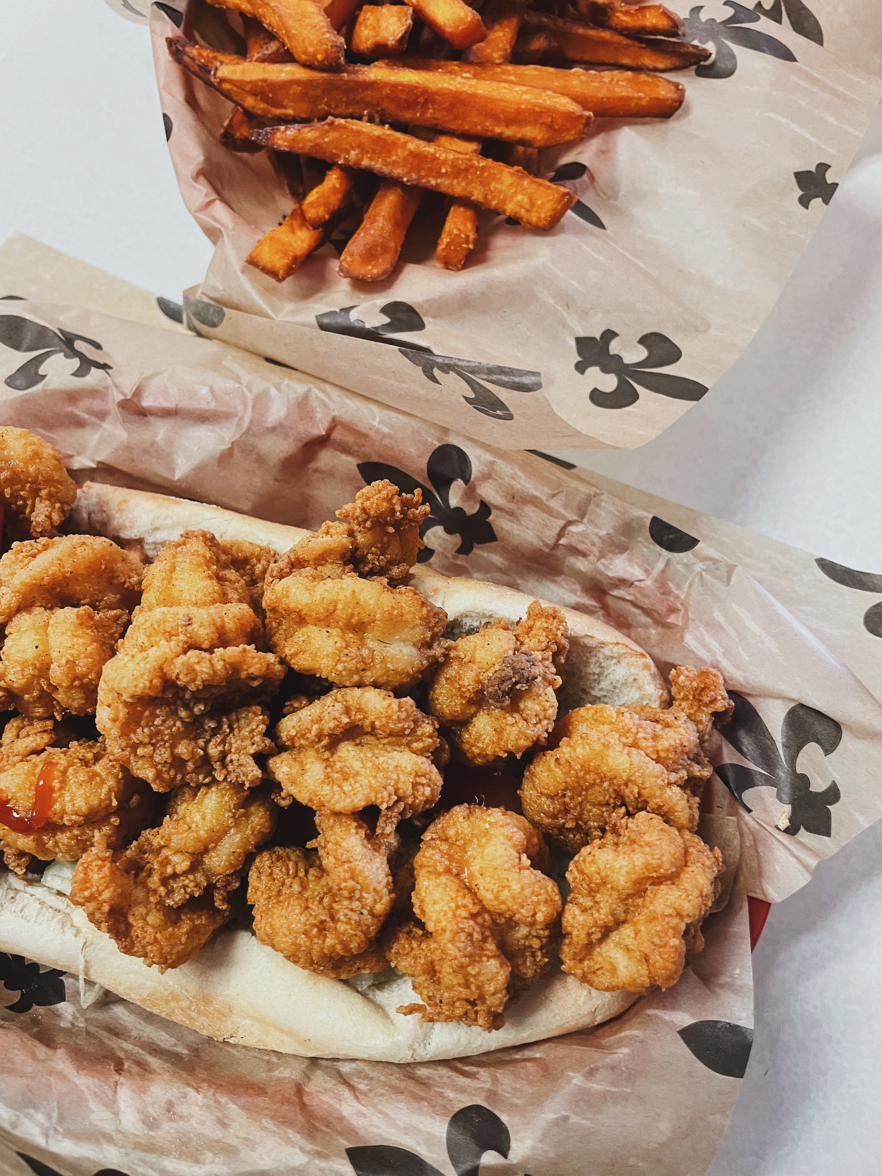 A Shimp Po-Boy And Sweet Potato Fries From Angelle's Old Fashioned Hamburgers