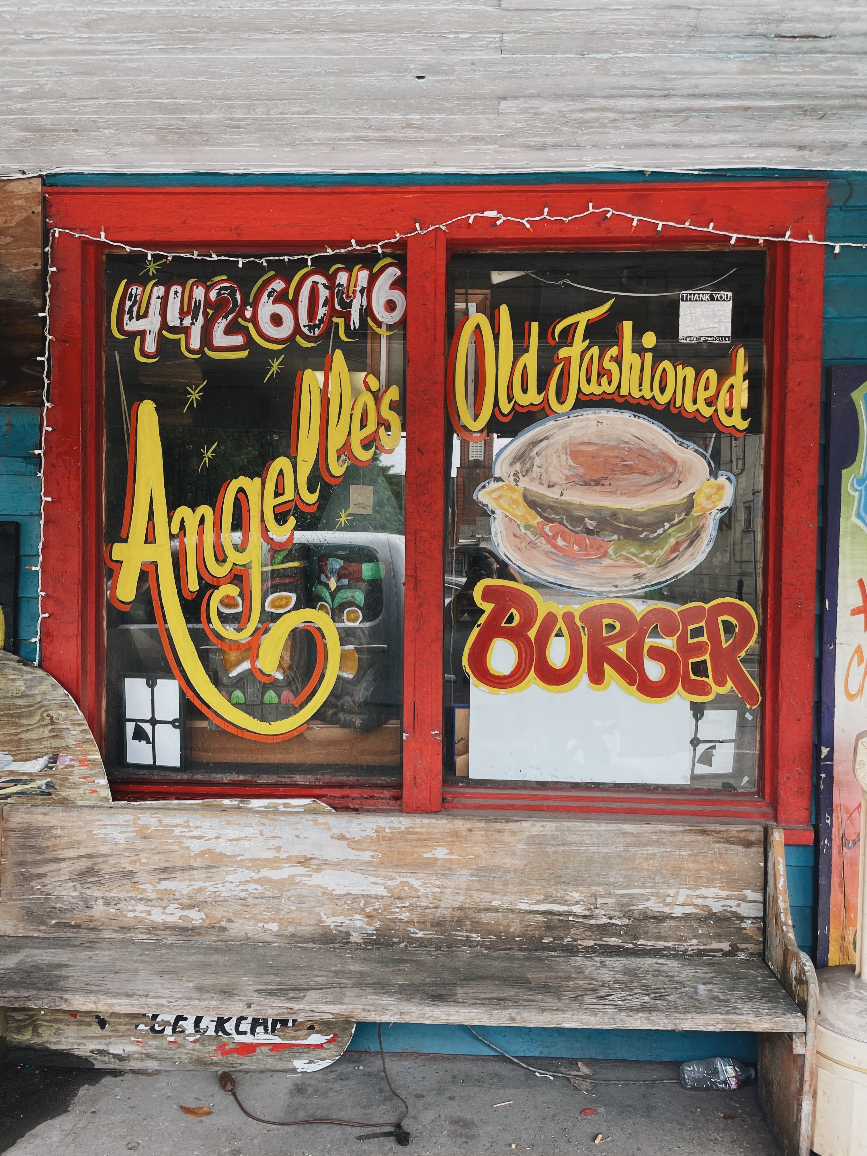 The Window Art and Signage Outside Angelle's Old Fashioned Hamburgers In Breaux Bridge, Louisiana