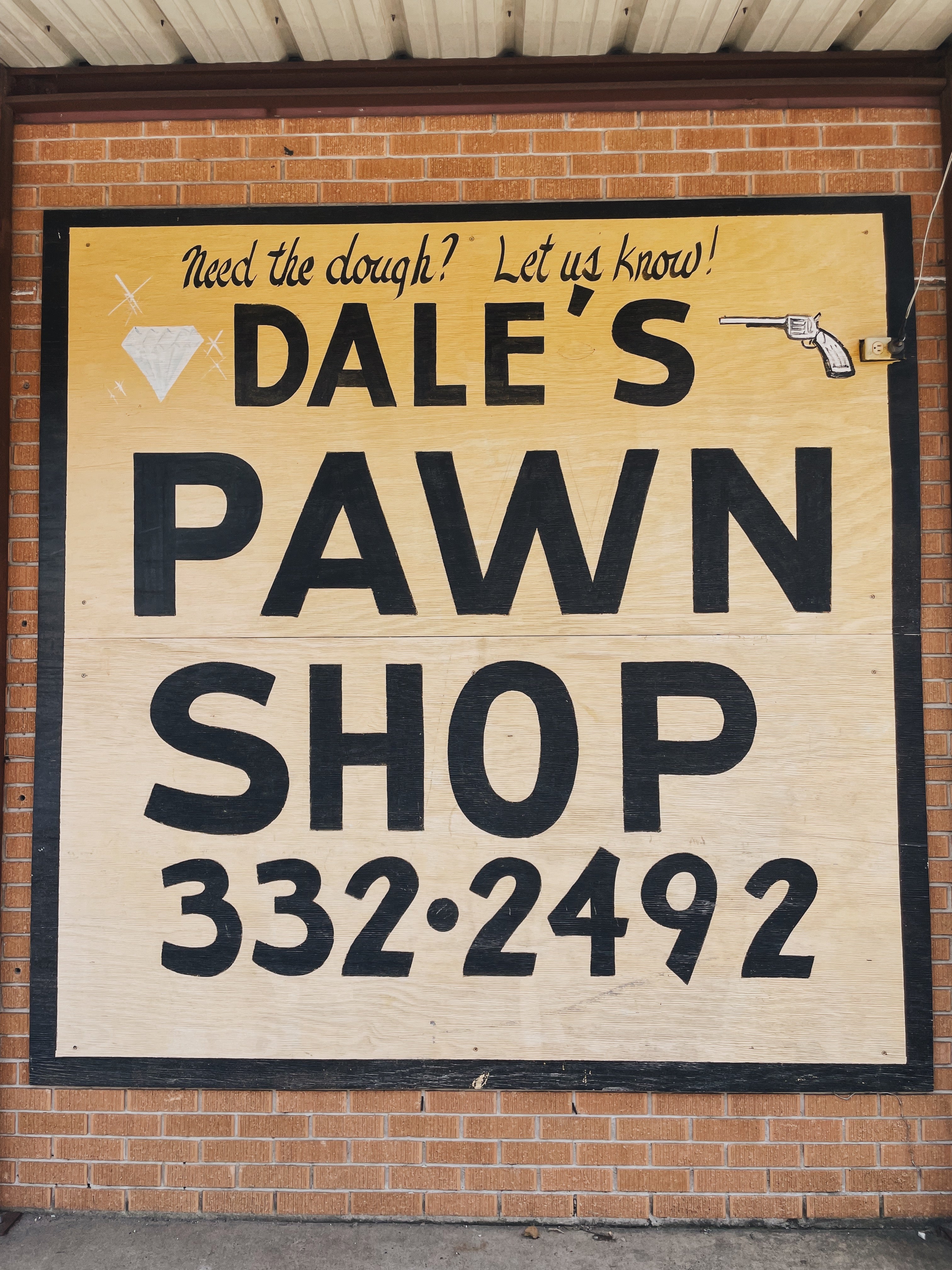Store Sign Outside Dale's Pawn Shop in Breaux Bridge, Louisiana