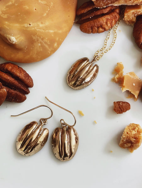 MIMOSA Handcrafted's Pecan Jewelry Collection Alongside Pralines