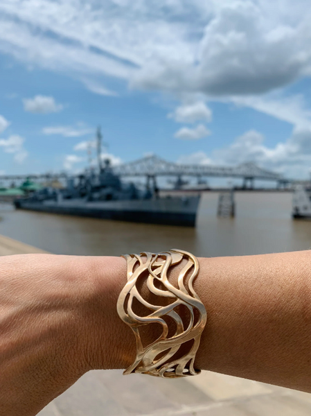 MIMOSA Handcrafted's Mississippi River Bracelet Featured Alongside the River that Inspired It