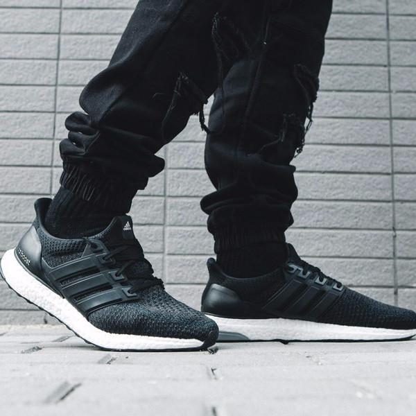 ultra boost 2.0 core black on feet 