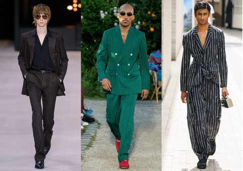 Models wearing a series of pinstripe suits. 