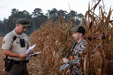 game warden checks hunter