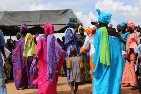 Women seen wearing colourful boubous