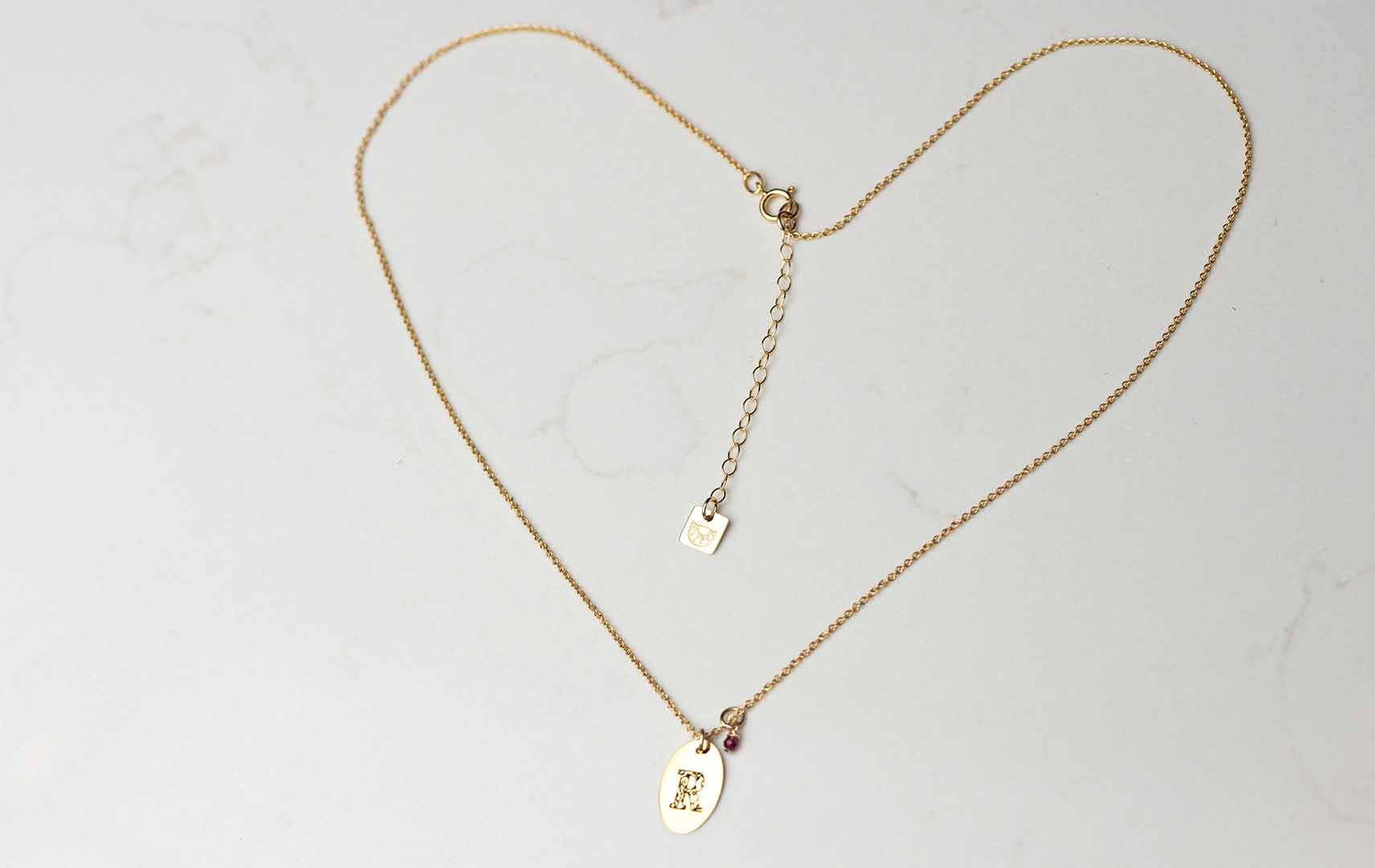 loveletter necklace in gold untangled
