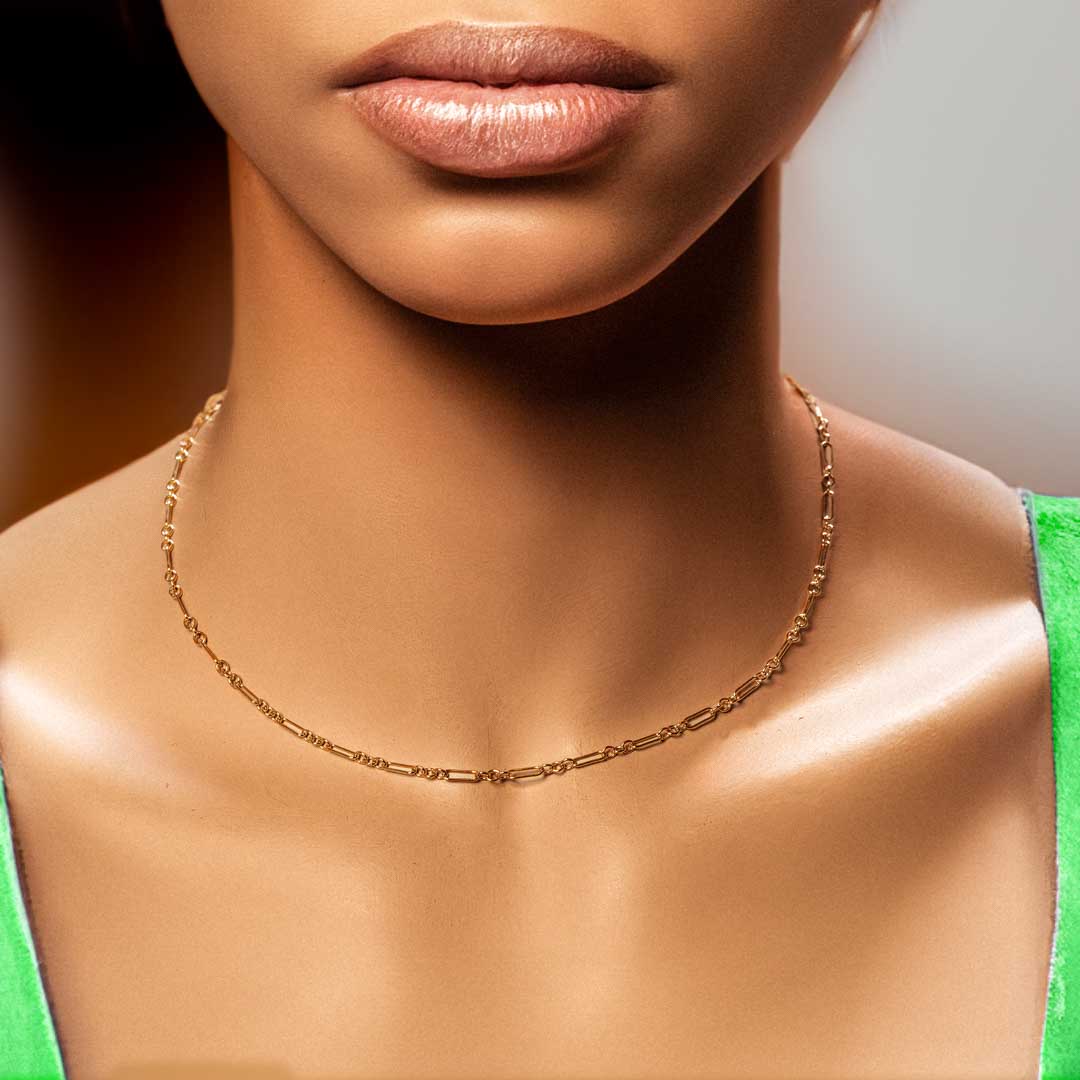 model wearing Figure 8 chain necklace gold