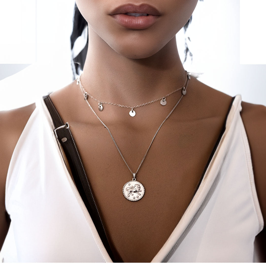 model wearing ce leo and piper necklaces silver