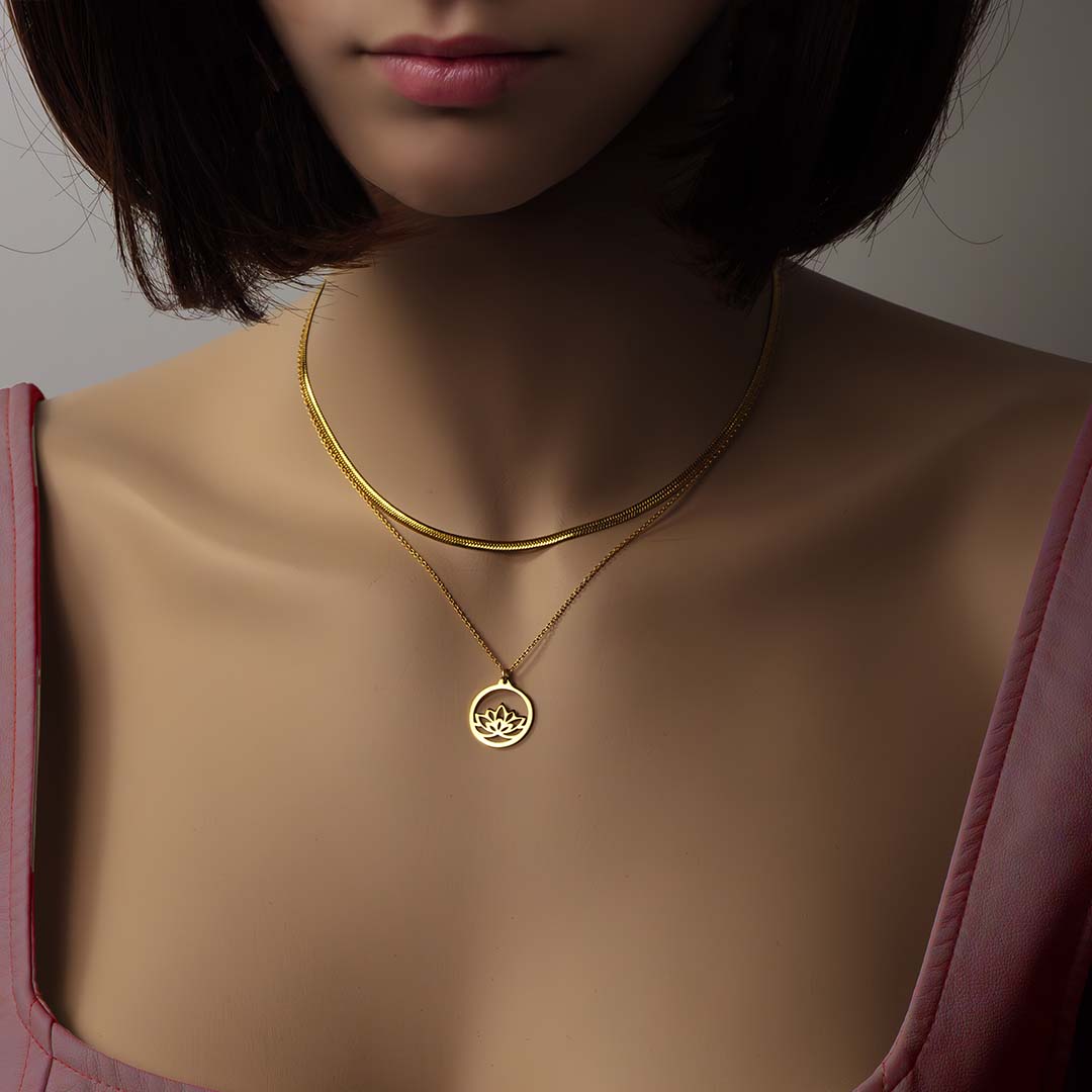 model wearing medusa baby lotus necklaces gold layered
