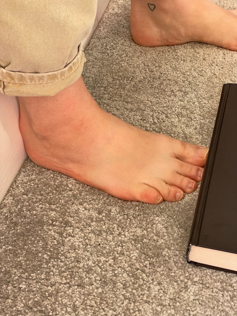 Heavy book to measure feet