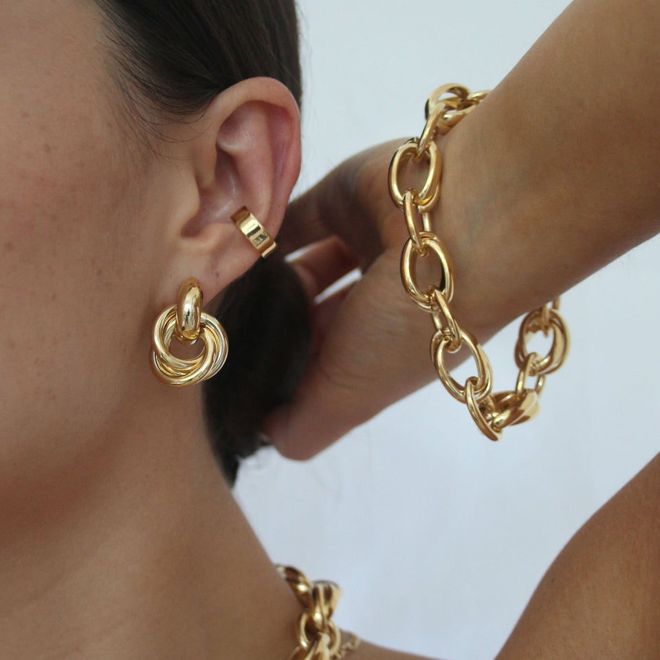 gold interlocking earrings