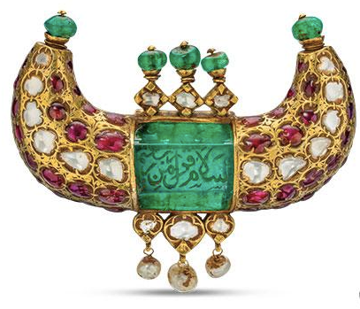 Mughal era gold horn pendant with 125 ct. Colombian emerald, diamonds, Burmese rubies, emerald beads, and pearls (photo by Robert Weldon/GIA)