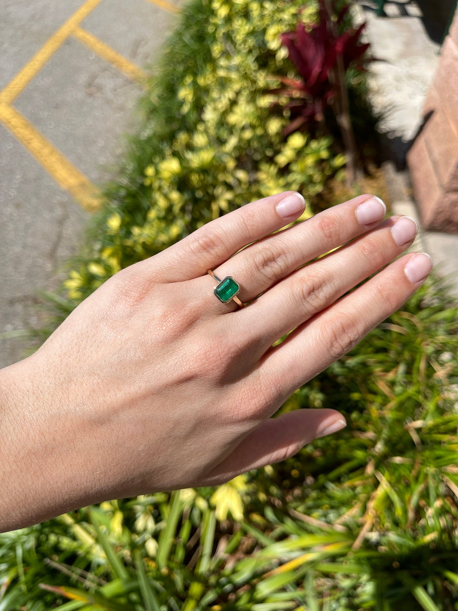 1.10 Carat Bezel Set Dark Green Emerald Cut Emerald Ring 14K