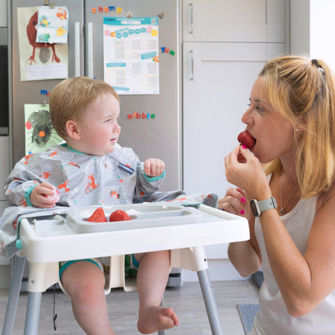 mother_and_baby_eating_strawberries