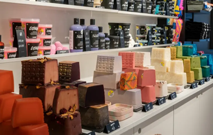 A selection of different coloured soaps in vibrant colours, colour-coordinated. Sourced from <span data-mce-fragment="1"><a href="https://weare.lush.com/lush-life/our-company/we-are-retail/" data-mce-fragment="1" data-mce-href="https://weare.lush.com/lush-life/our-company/we-are-retail/">LUSH</a></span>.