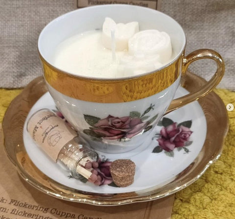 A floral sculptural candle hand-poured into a floral teacup from <span data-mce-fragment="1"><a href="https://www.instagram.com/p/Cu1qGlOsOWe/?img_index=1" data-mce-fragment="1" data-mce-href="https://www.instagram.com/p/Cu1qGlOsOWe/?img_index=1">Flickering Cuppa</a></span>