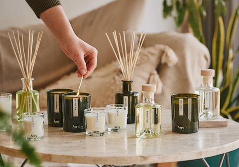A product image of candles and reed diffusers in various sizes and colours. Source: Aery Living.