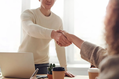 <span style="font-weight: 400;" data-mce-fragment="1" data-mce-style="font-weight: 400;">A man and woman shaking hands and sealing a business deal. Source: </span><a href="https://www.pexels.com/photo/man-and-woman-near-table-3184465/" data-mce-fragment="1" data-mce-href="https://www.pexels.com/photo/man-and-woman-near-table-3184465/"><span style="font-weight: 400;" data-mce-fragment="1" data-mce-style="font-weight: 400;">Pexels</span></a>