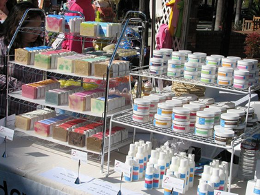 Handmade soaps stacked on a metal wire rack in a uniform manner. Sourced from <span data-mce-fragment="1"><a href="https://www.pinterest.co.uk/pin/297519119144419616/" data-mce-fragment="1" data-mce-href="https://www.pinterest.co.uk/pin/297519119144419616/">Pinterest</a></span>.