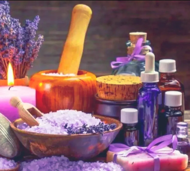 Lavender-themed aromatherapy set-up, including bath salts, fragrance oils and wax melt. Sourced from The Healthy Practice.
