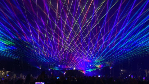 colorful laser beams for music festival