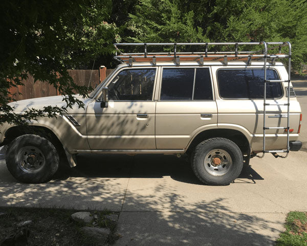 Land Cruiser With A Custom Ladder And DIY Roof Rack