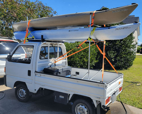 Mini Truck With A Custom Kayak Rack & Two Kayaks Secured