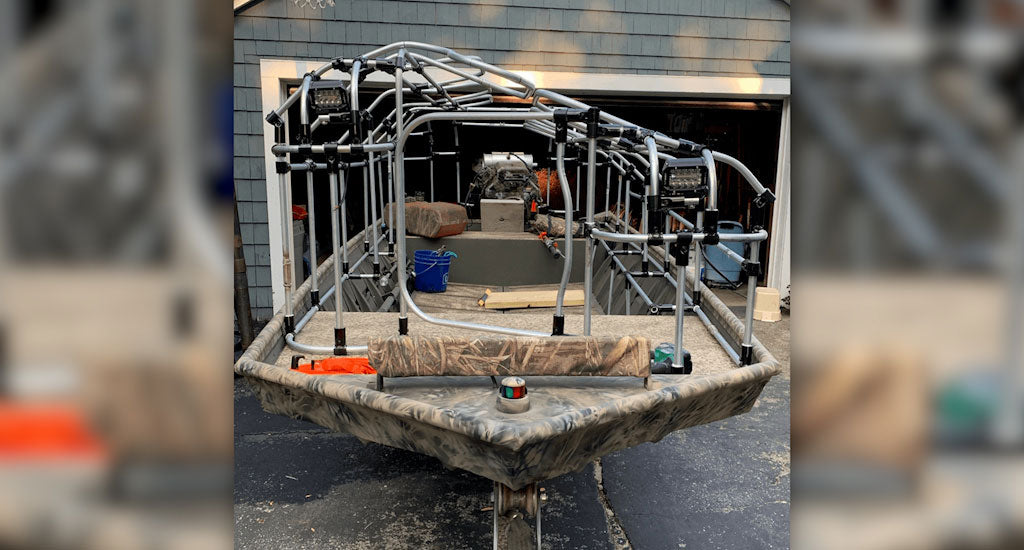 a-jon-boat-equipped-with-a-custom-duck-blind