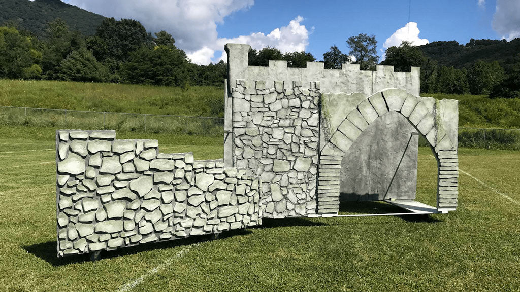 a DIY castle made from foam, wood, and pipes