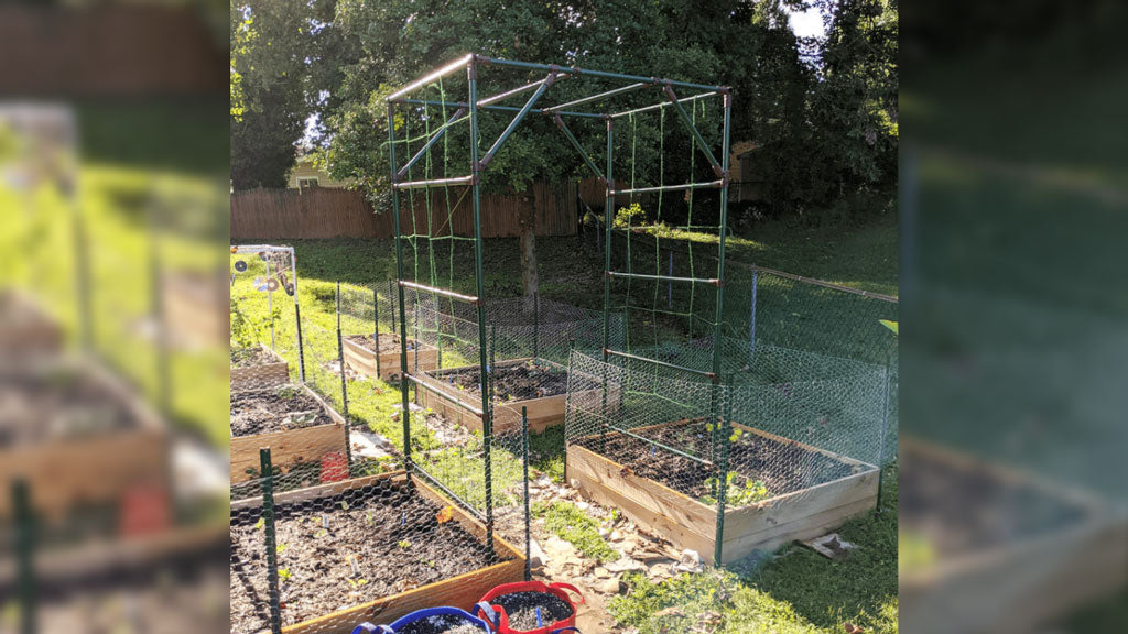 DIY Garden Bed Arch Trellis Made With Electrical Conduit