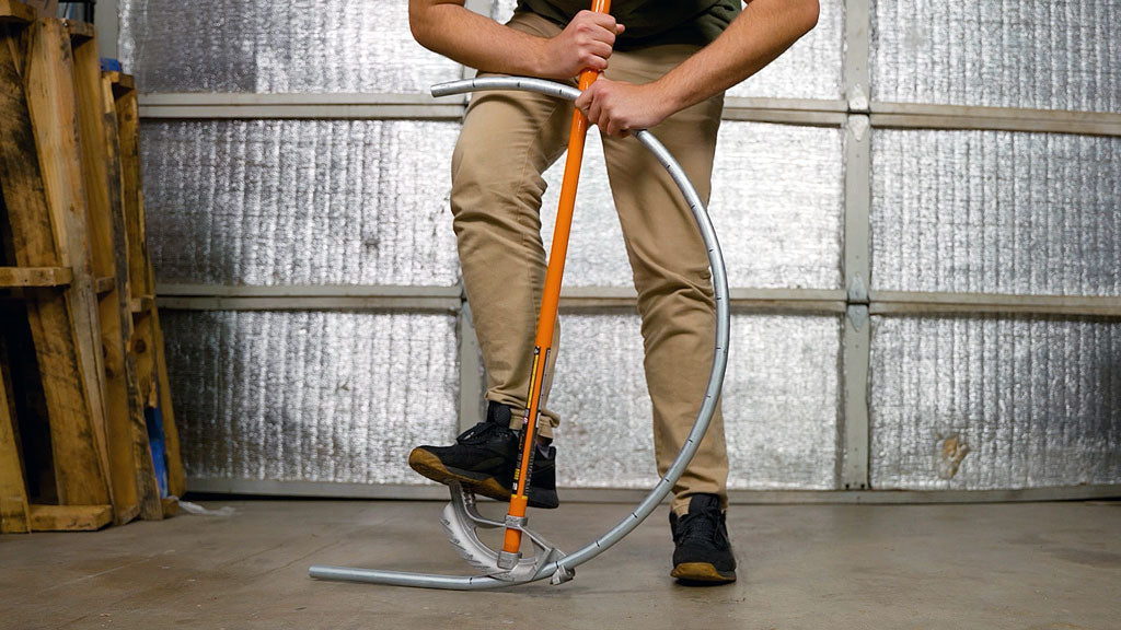 a builder bending an arch with emt conduit