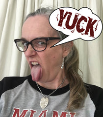 Laughing Frog Studio's Jen Edmondson Wearing Spoon Earrings and Stamped Spoon Necklace while making a YUCK face