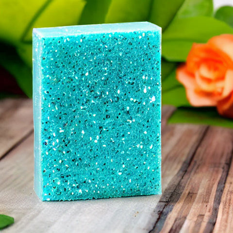 turquoise colored soap bar with glitter on front