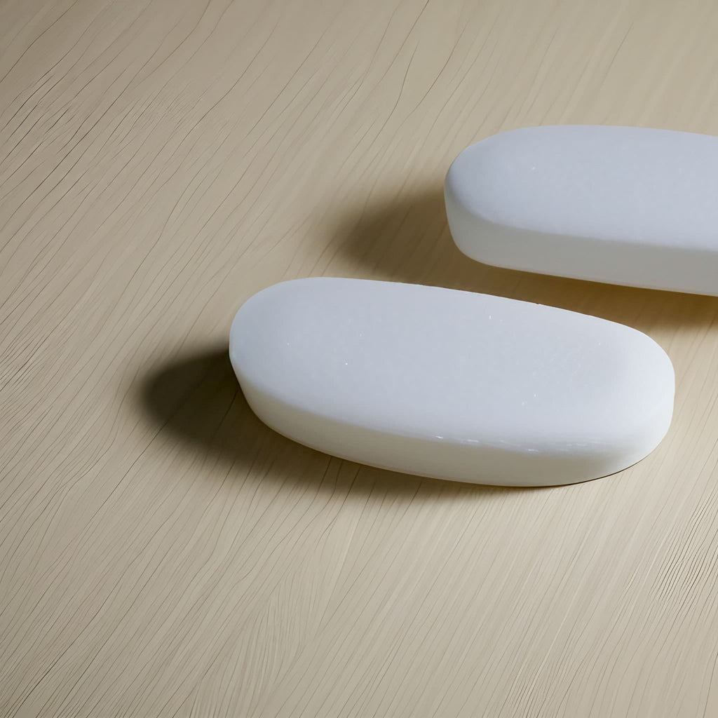 two milled soap bars on a table