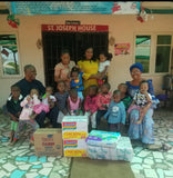 Visiting the orphanage with supplies.