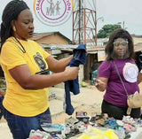 Sorting out clothes for the orphanage 