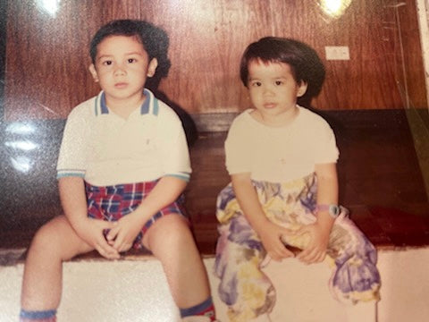 A childhood photo of Victoria and Miggy Reyes, the sibling co-founders of Narra.