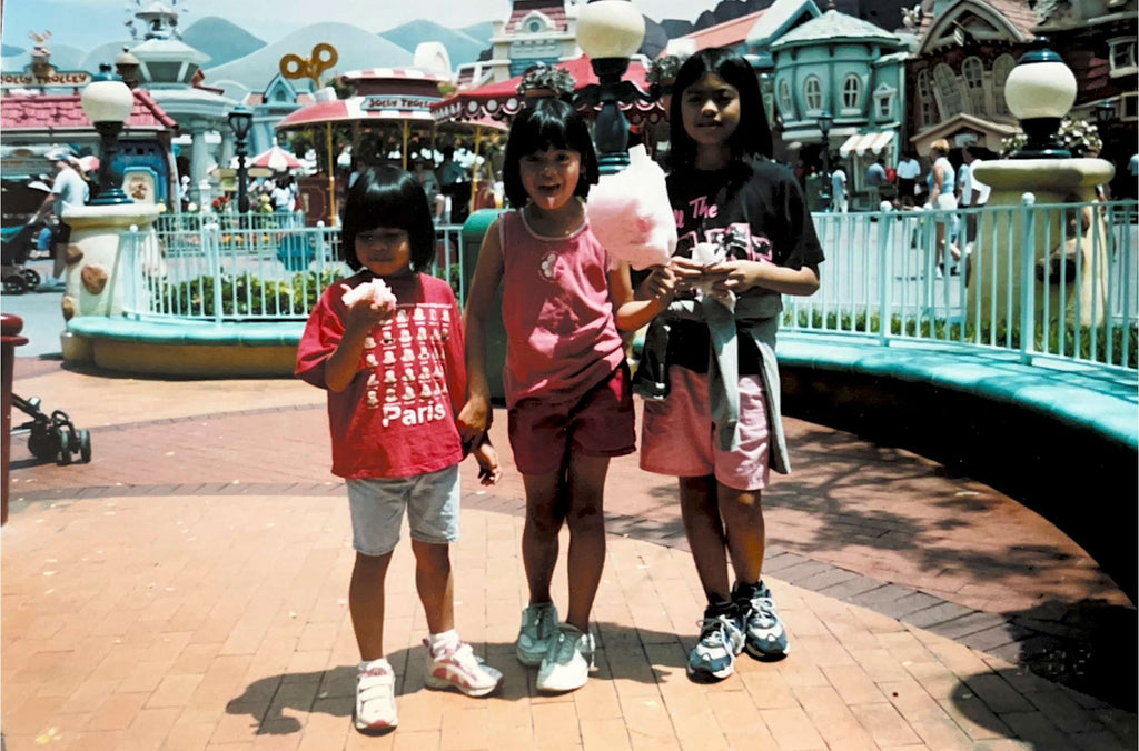 An old childhood photo of Abi Balingit, author of Mayumu: Filipino American Desserts Remixed, with her two sisters