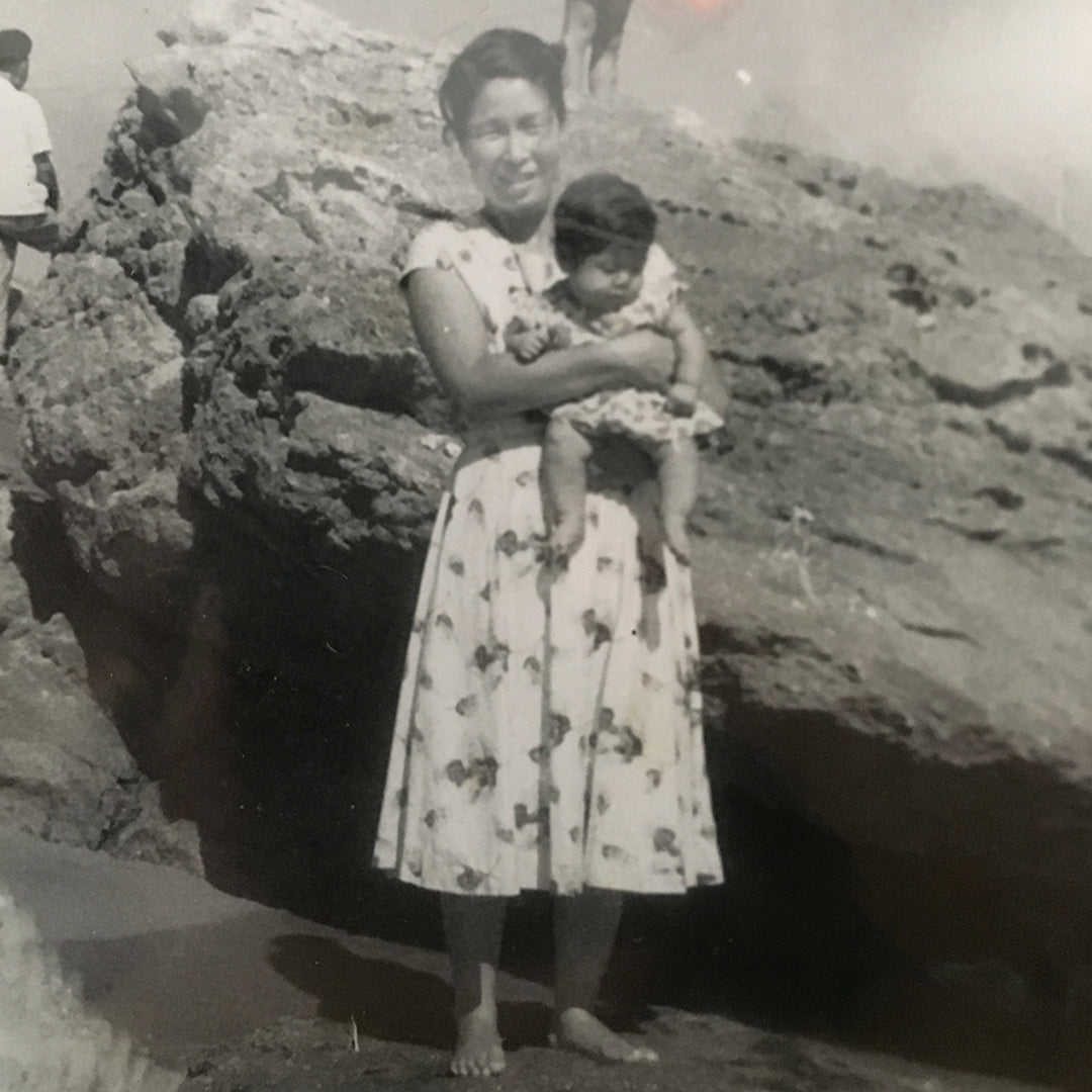 Halmi founder Hannah Bae's grandmother holding Hannah's mother as a baby.