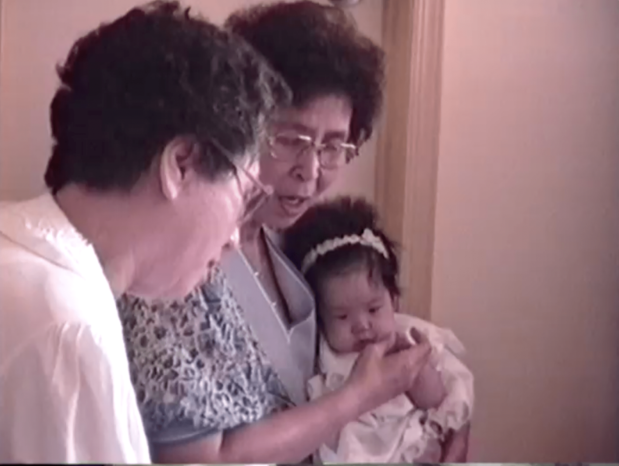 Childhood photo of Halmi founder Hannah Bae and her grandparents.